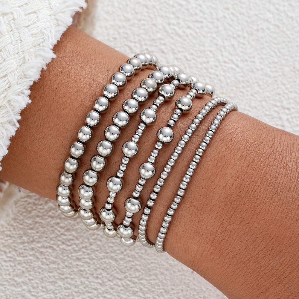Fashionable and simple elastic beaded bracelets 7 pieces