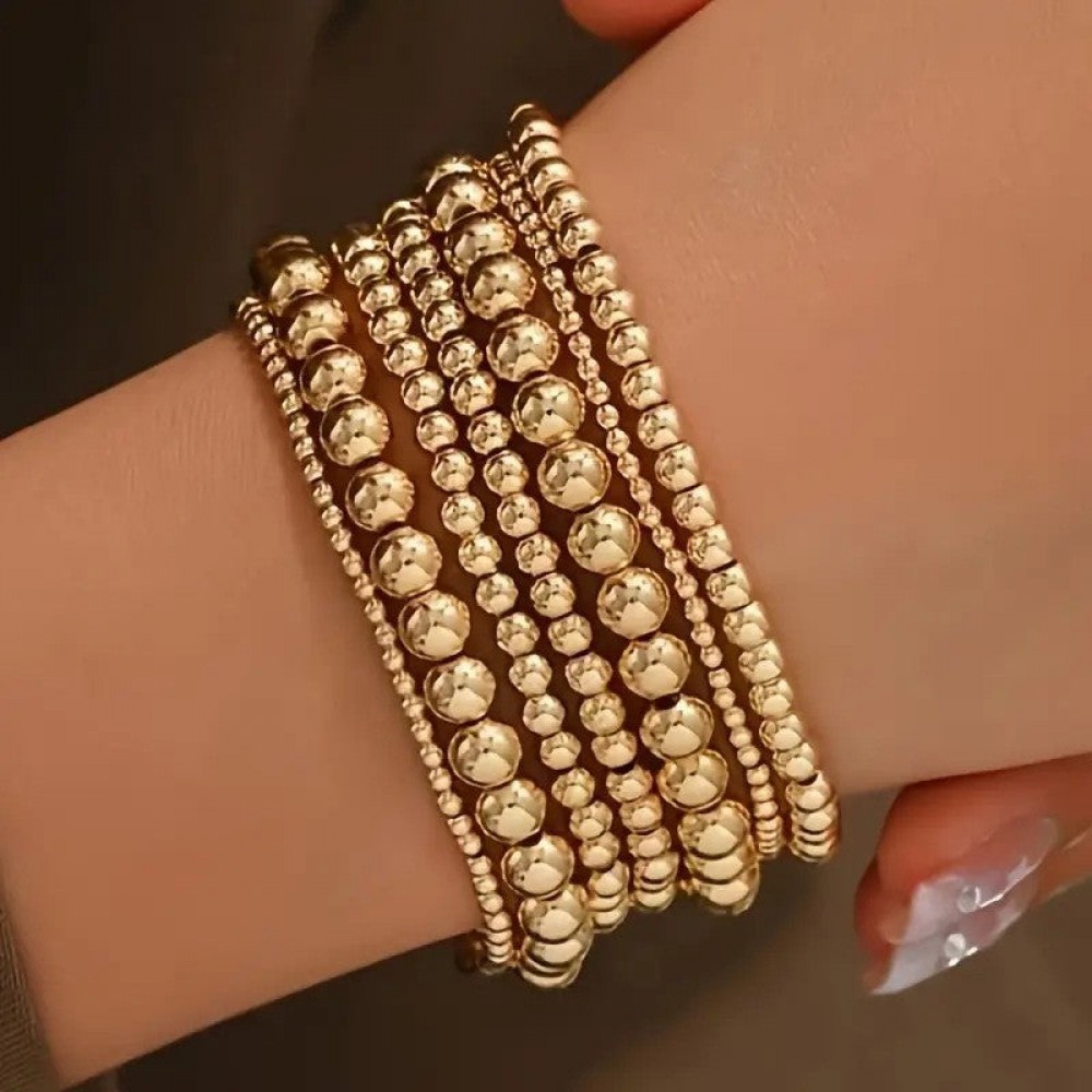 Fashionable and simple elastic beaded bracelets 7 pieces