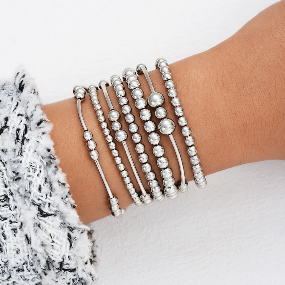Fashionable and simple elastic beaded bracelets 7 pieces